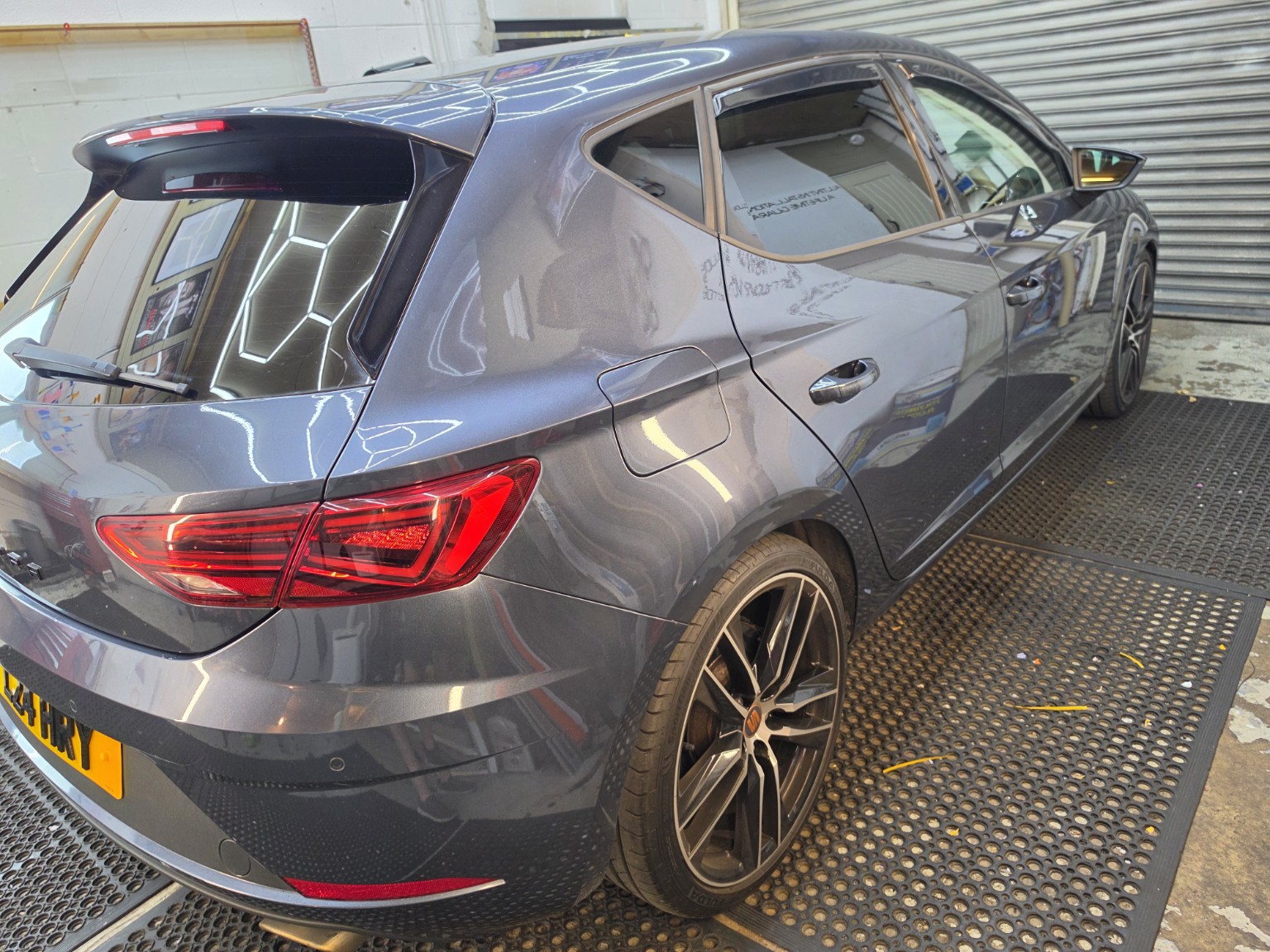 Grey SUV with tinted rear passenger windows
