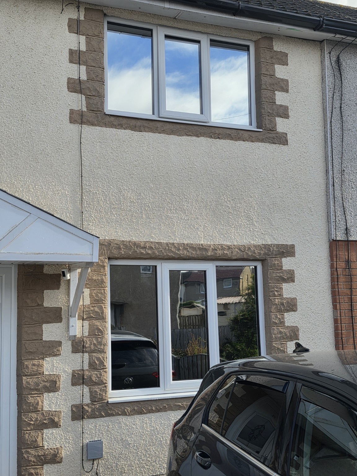 Two-storey home with tinted windows