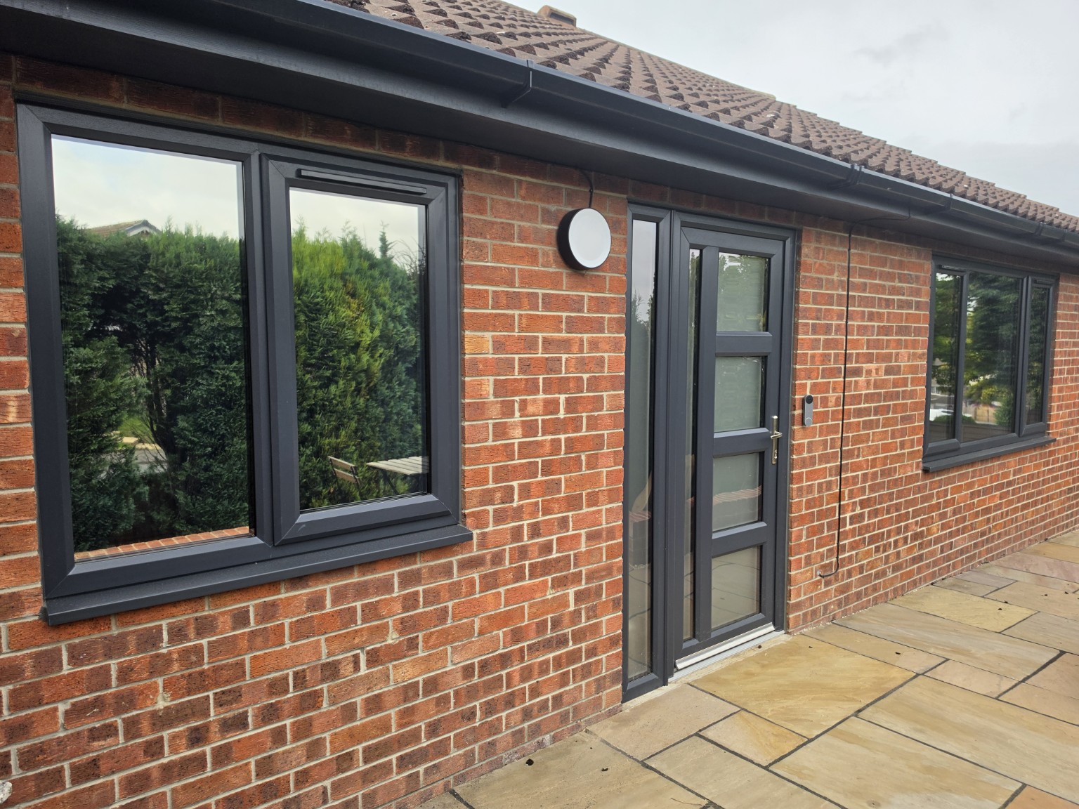 Brick home with tinted front windows