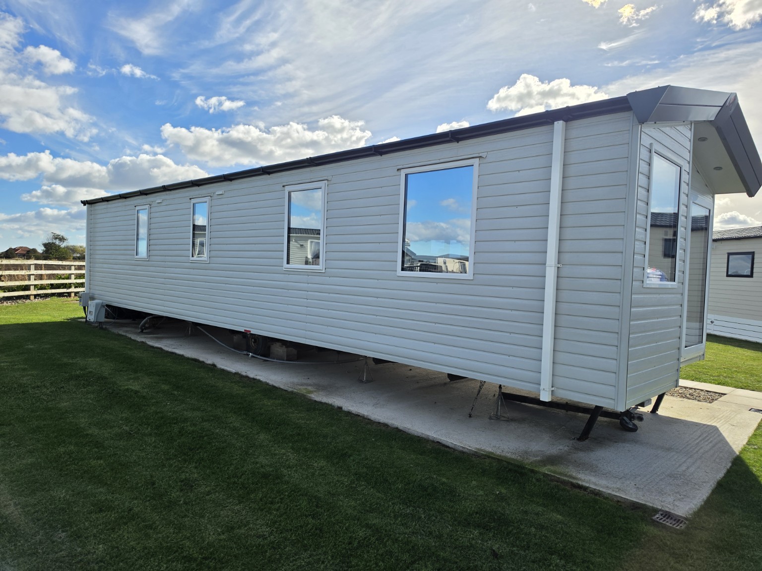 Holiday lodge exterior with window film