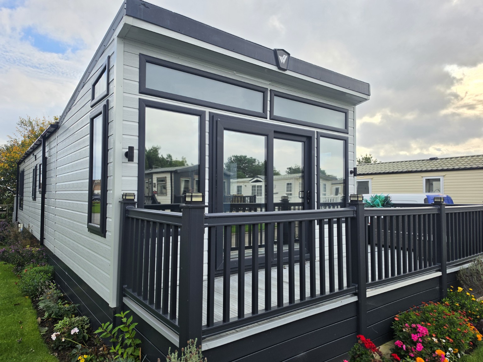 Holiday lodge exterior with tinted glazing