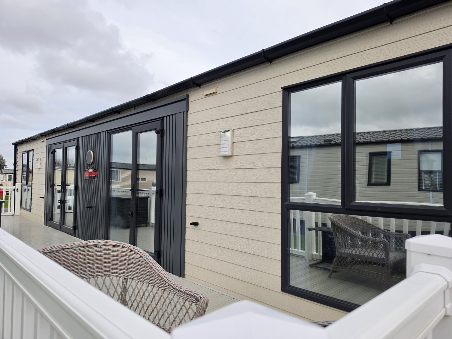 Holiday lodge with dark privacy film on the windows